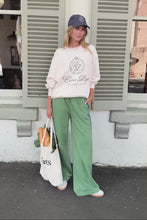 Load and play video in Gallery viewer, GIGI | Wide Leg Terry Trackpant | Pistachio + Washed Navy Side Stripe
